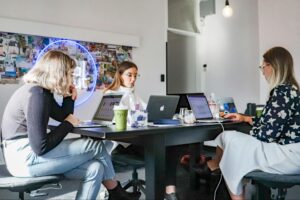 Business owner analyzing BPO performance metrics dashboard with graphs for customer satisfaction, turnaround time, and SLA adherence.